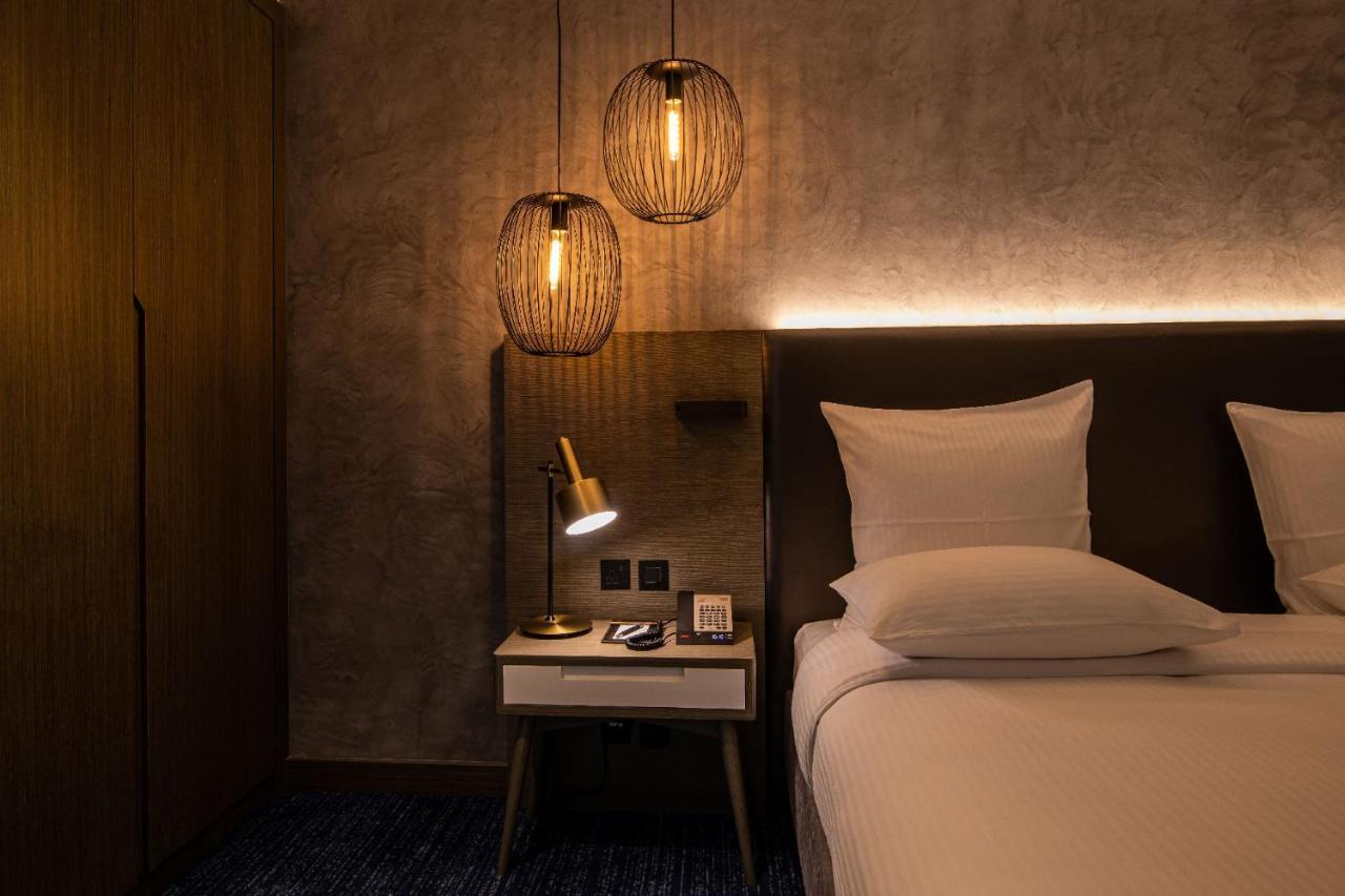 Pullman Sharjah Ξενοδοχείο Εξωτερικό φωτογραφία A room at the hotel