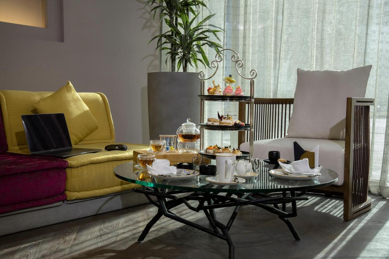 Pullman Sharjah Ξενοδοχείο Εξωτερικό φωτογραφία Afternoon tea at the Mandarin Oriental, Hong Kong